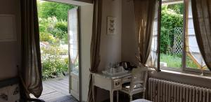 B&B / Chambres d'hotes Le jardin de Saint Jean : photos des chambres