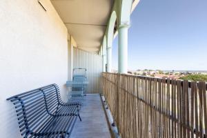 Appartements T2 climatise avec piscine au pied du tram arenes romaines : photos des chambres