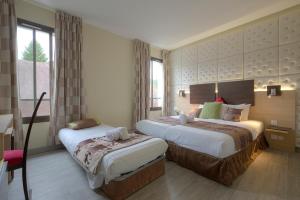 Hotels Au Grand Hotel de Sarlat - Pavillon de SELVES : photos des chambres