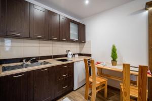 Domek u Świerków - pokoje i apartamenty z aneksami blisko Term Chocholowskich