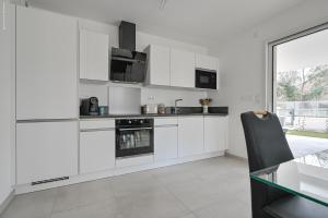 T3 NEUF – C13 - JARDIN-TERRASSE ET PISCINE – ACCÈS DIRECT PLAGES ET CENTRE VILLAGE