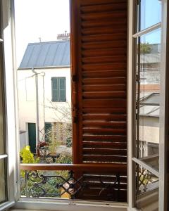Appartements PARIS AUTHENTIC HOUSE Small, bright and calm studio : photos des chambres