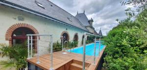 Maisons de vacances Demeure de 6 chambres avec piscine interieure jacuzzi et jardin clos a Vernou sur Brenne : photos des chambres