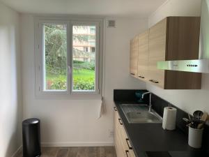 Appartements Au Coeur du Parc : photos des chambres