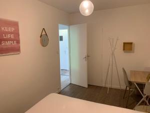 Appartements Au Coeur du Parc : photos des chambres