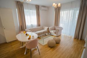 Central Apartments with City View & Large Balcony