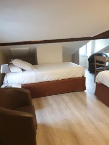 Appart'hotels L'Hotellerie de la Toile a Beurre : photos des chambres