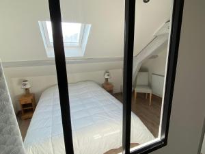 Appartements Les 4 flocons, avec piscine exterieure chauffee a 100m du lac et du centre , wifi, parking, sauna : photos des chambres