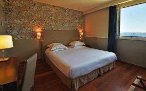 Hotels Hotel Restaurant Christophe Colomb : photos des chambres