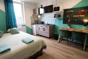 Appartements Capsule Color Valenciennes : photos des chambres