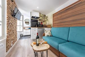 Appartements Chez Ingres - Le Nid - Joyau cache en centre ville : photos des chambres