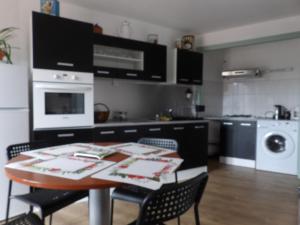 Appartements Hebergement des thermes : photos des chambres