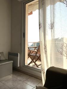 Coquet appartement avec terrasse sur la mer