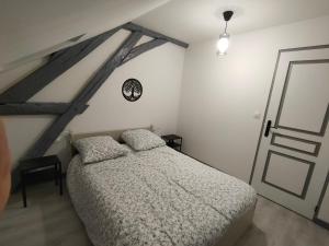 Appartements LA MACHINE Sous Combles : photos des chambres