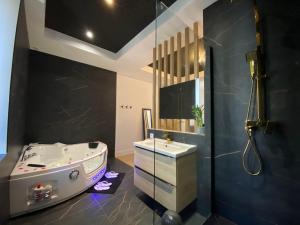 Appartements Loft Romantique avec jacuzzi a Saint-Etienne : photos des chambres