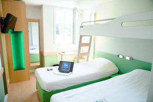 Hotels ibis budget Aeroport le Bourget Garonor : Chambre Triple avec 3 Lits Simples