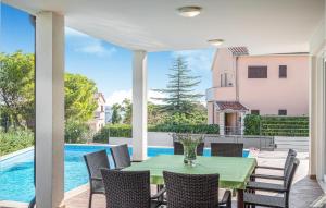Nice home in Premantura w Outdoor swimming pool and 6 Bedrooms