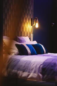 Appartements Capsule Temps suspendu - balneo, home cinema & billard : photos des chambres
