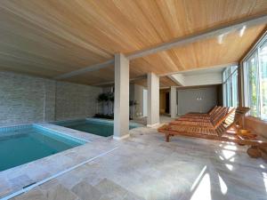 Apto 2 Dorms, 1 Suíte, JP2 Home Resort Ubatuba - Churrasqueira Gourmet, Ar Condicionado, Piscinas, Sauna e Salão de Jogos