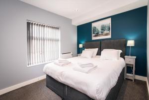 Arena Apartments - Stylish and Homely Apartments by the Ice Arena with Parking