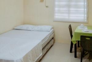 Skyleigh Apartelle by RedDoorz