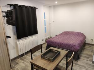 Appartements Studio plein pied : photos des chambres