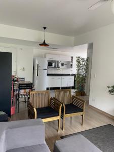 Recanto Verde-Apto na Praia do Tombo Guarujá