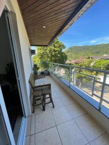 Recanto Verde-Apto na Praia do Tombo Guarujá