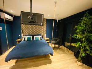 Appartements Capsule le temps suspendu balneo & home cinema & billard : photos des chambres