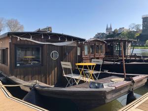 Bateaux-hotels Logement insolite La Toue Cabanee centre ville : photos des chambres