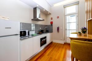 Mouzinho 129 - Medronheiro & Oliveira