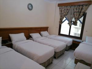 Economy Quadruple Room room in فندق سلسبيل الفضي