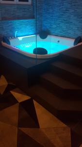 Chambre Lit King-Size avec Baignoire Spa