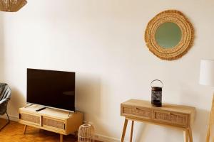 Appartements Violettes Blanches Cosy Parking prive TV WiFi : photos des chambres