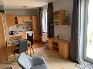 Einraumapartment mit Seeblickbalkon