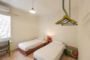 Double or Twin Room with Shared Bathroom room in The Grand Meshmosh Hotel