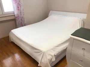 bedroom with bathroom shower