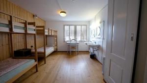 Quadruple Room with Shared Bathroom room in Leissigen Youth Hostel