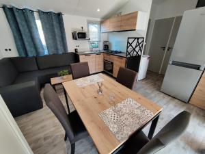 Complexes hoteliers Grand Mobil home 10 places avec 4 chambres SIBLU proche Ocean : photos des chambres