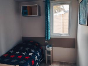 Appartements Mobil Home 6 personnes Camping 5 etoiles : photos des chambres