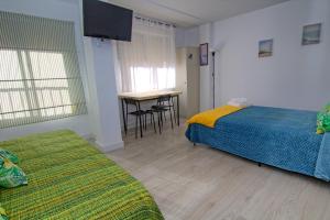 Mercado Huelin Apartments