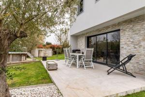 Maisons de vacances Les Arenes : photos des chambres
