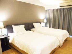 Grand Tower Inn Sathorn Hotel