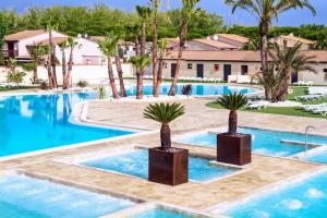 Maisons de vacances Maison avec piscine chauffee de Paques a la toussaint TAMARIS acces animation & parc aquatique DE juin a fin septembre : photos des chambres