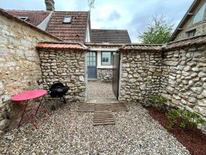 Appartements Maison climatise avec jardin : photos des chambres