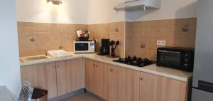 Appartements Bas de maison de village cosy & relax : photos des chambres