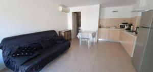 Appartements Bas de maison de village cosy & relax : photos des chambres