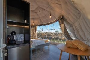 Tentes de luxe Au Champ de l'Insolite : photos des chambres