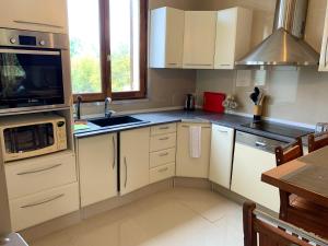 Maisons de vacances Maison spacieuse avec jardin a Saint-Brice-sous-Foret : photos des chambres