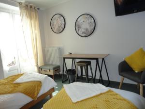 Hotels Aux Armes D Estaing : photos des chambres